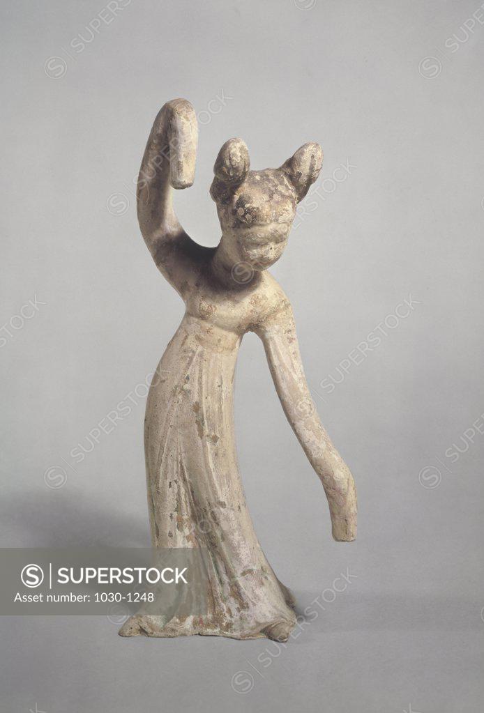 Stock Photo: 1030-1248 Funerary Statue:  Dancer  T'ang Dynasty 618-907 Artist Unknown (Chinese) Terra Cotta   Musee Guimet, Paris  