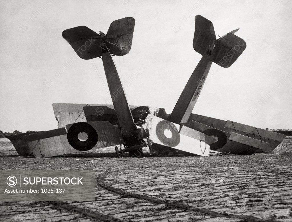 Stock Photo: 1035-137 Two crashed biplanes in a field, 1919