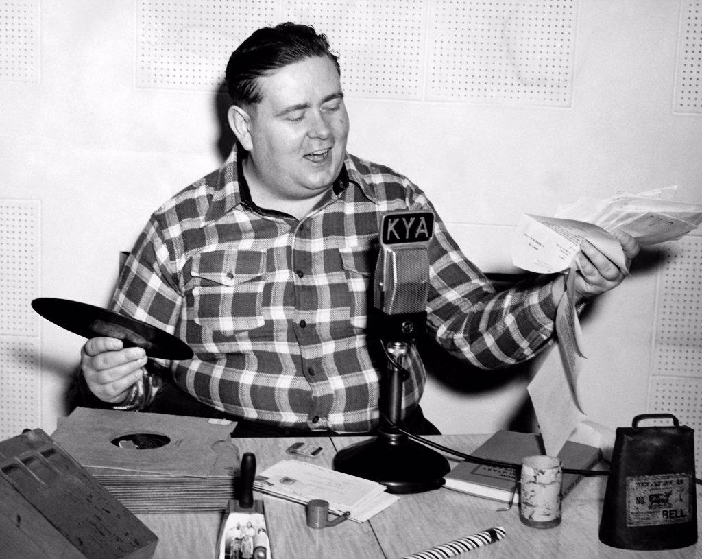 San Francisco, California:  c. 1948 'Cowboy Bob' hosting his popular Western music show on KYA radio.