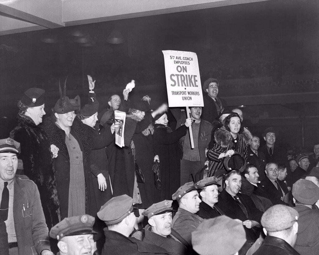 New York, New York:   1937 Fifth Avenue coach employees of the Transit Workers Union at a bus strike union meeting.