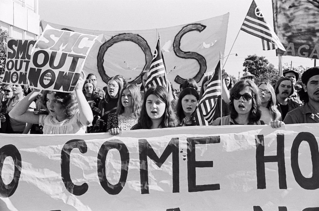 San Francisco, California: 1971 The head of an anti Vietnam War peace march up Geary Boulevard.
