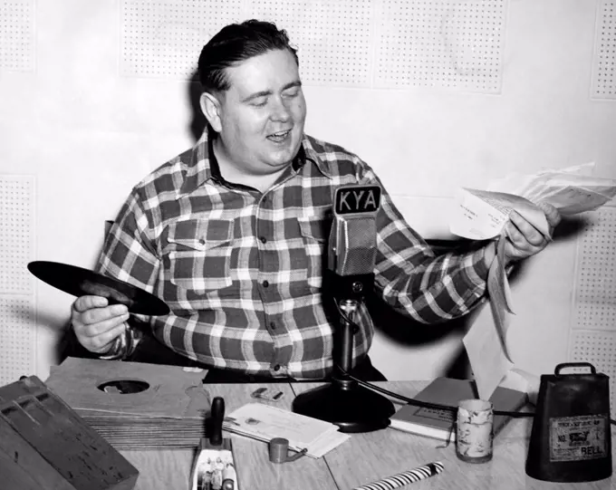 San Francisco, California:  c. 1948 'Cowboy Bob' hosting his popular Western music show on KYA radio.