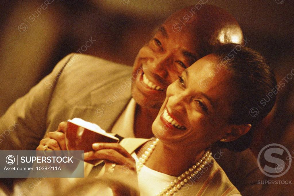 Stock Photo: 1038-211A Mid adult couple smiling