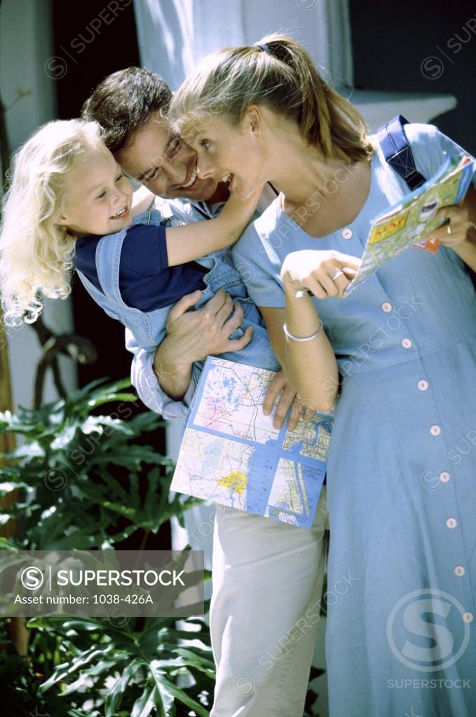 Stock Photo: 1038-426A Parents with their daughter