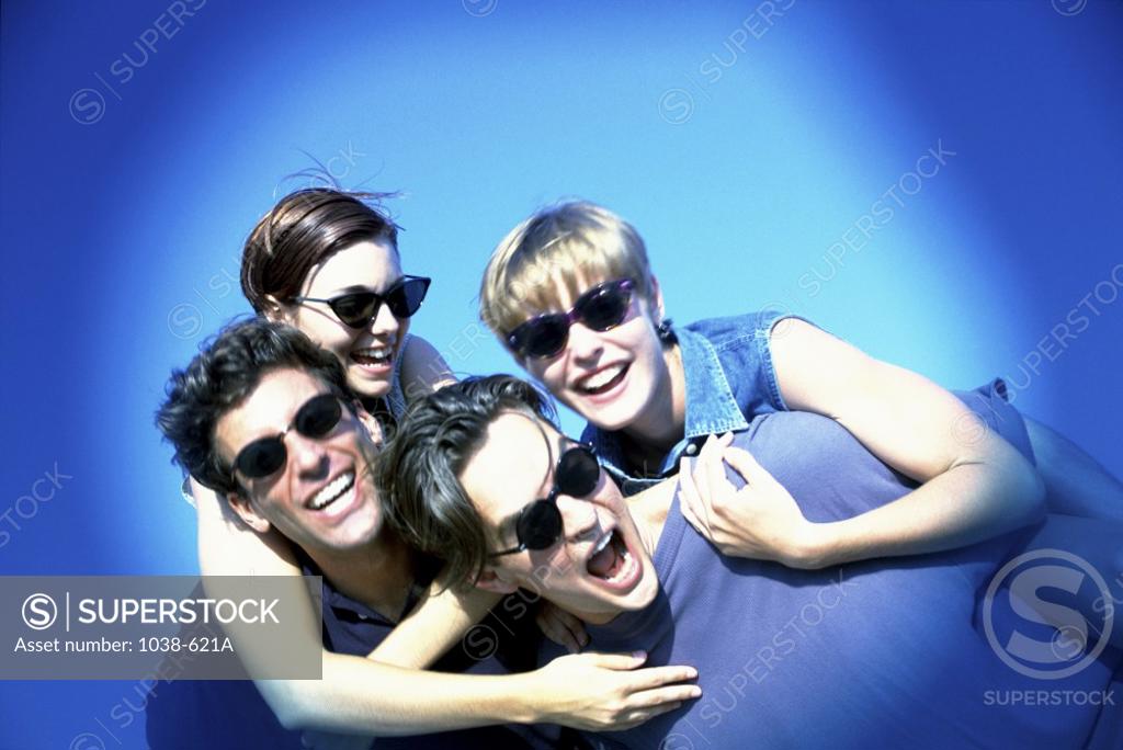 Stock Photo: 1038-621A Two young couples laughing