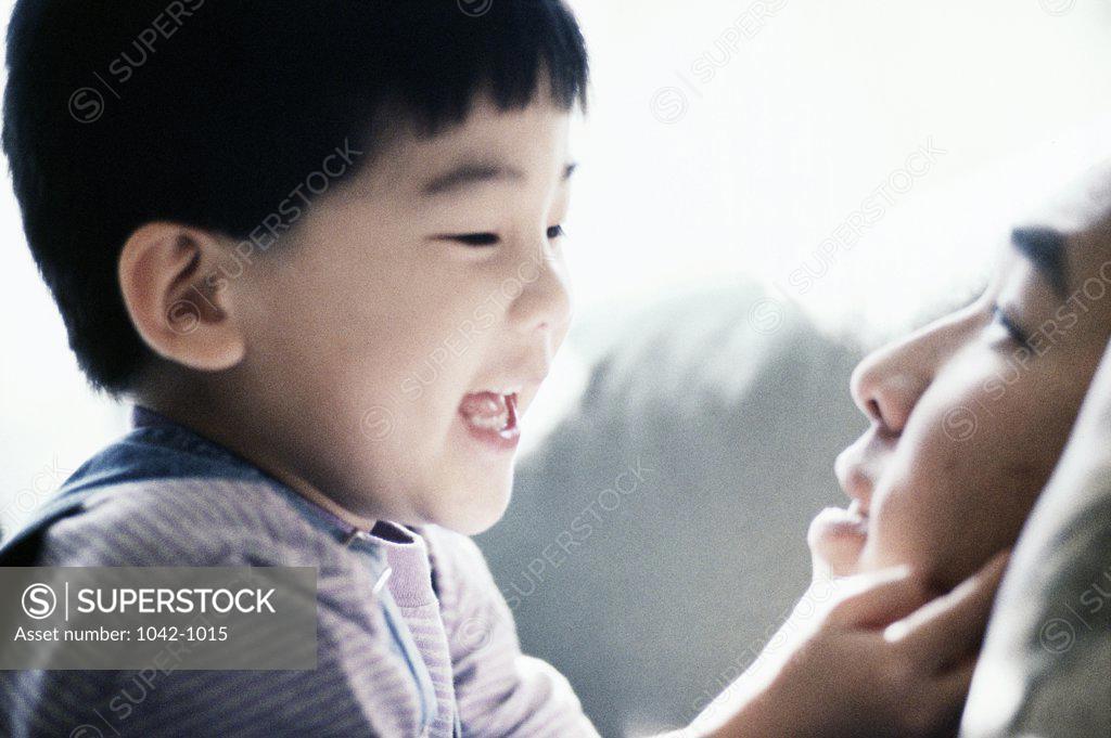 Stock Photo: 1042-1015 Close-up of a boy with his father