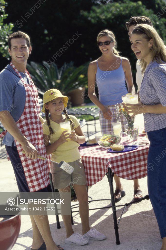 Stock Photo: 1042-10452 Group of people at a barbecue
