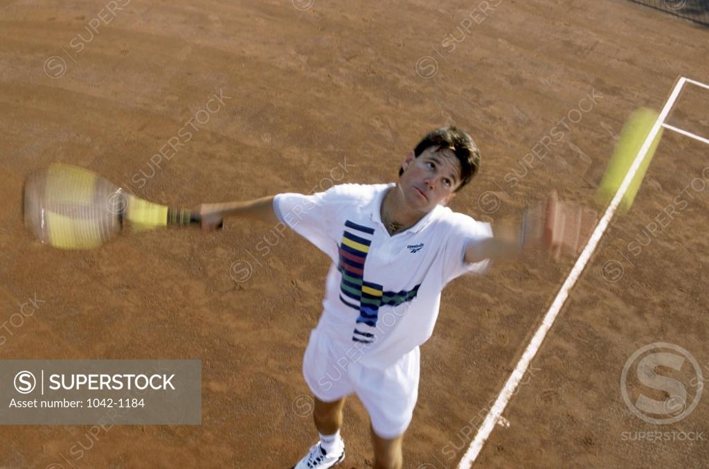 Stock Photo: 1042-1184 High angle view of a young man playing tennis