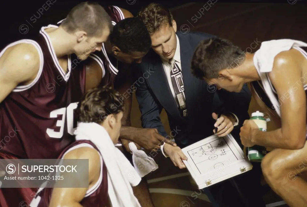 Basketball team in a huddle