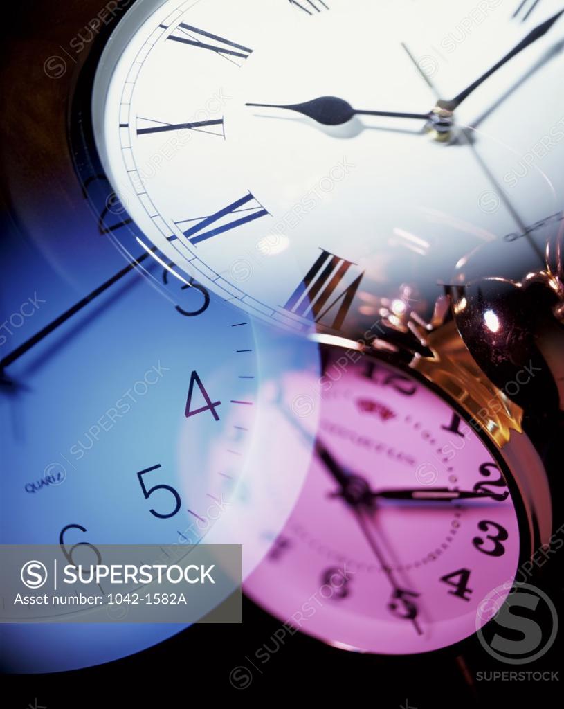 Stock Photo: 1042-1582A Close-up of clock faces