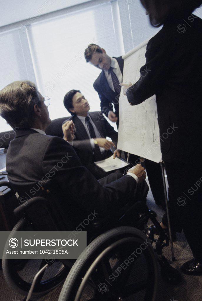 Stock Photo: 1042-1805A Business executives talking in an office