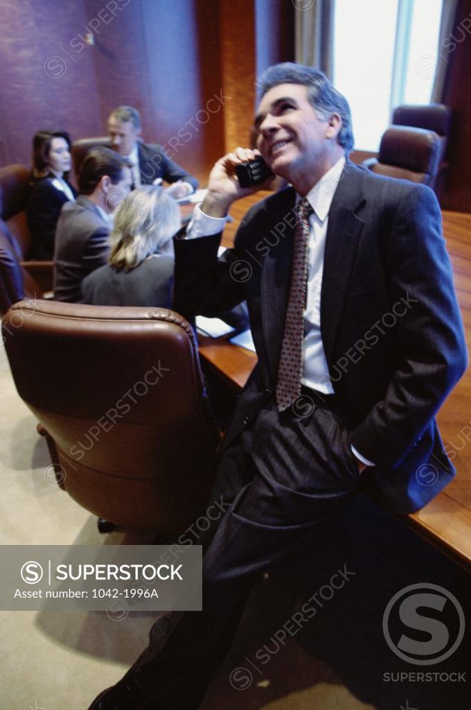 Stock Photo: 1042-1996A Businessman talking on the telephone