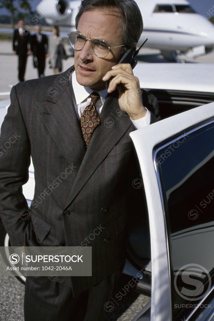 Stock Photo: 1042-2046A Businessman talking on a mobile phone