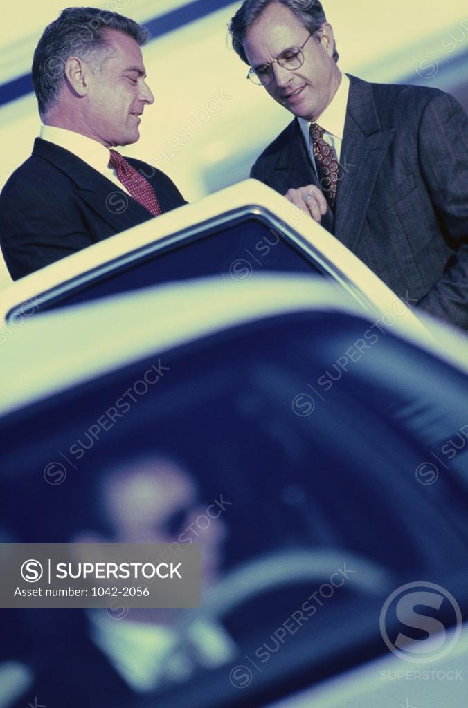 Stock Photo: 1042-2056 Two businessmen discussing