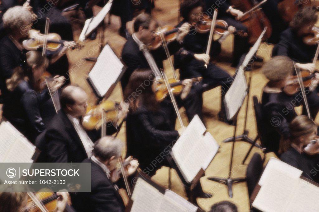Stock Photo: 1042-2133 High angle view of an orchestra playing in a concert hall