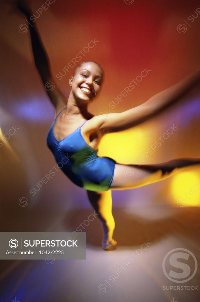 Stock Photo: 1042-2225 Portrait of a ballerina dancing on one leg
