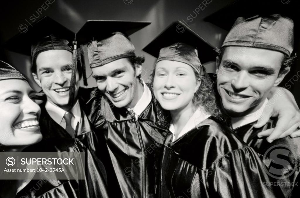Stock Photo: 1042-2945A Portrait of a group of young graduates standing together
