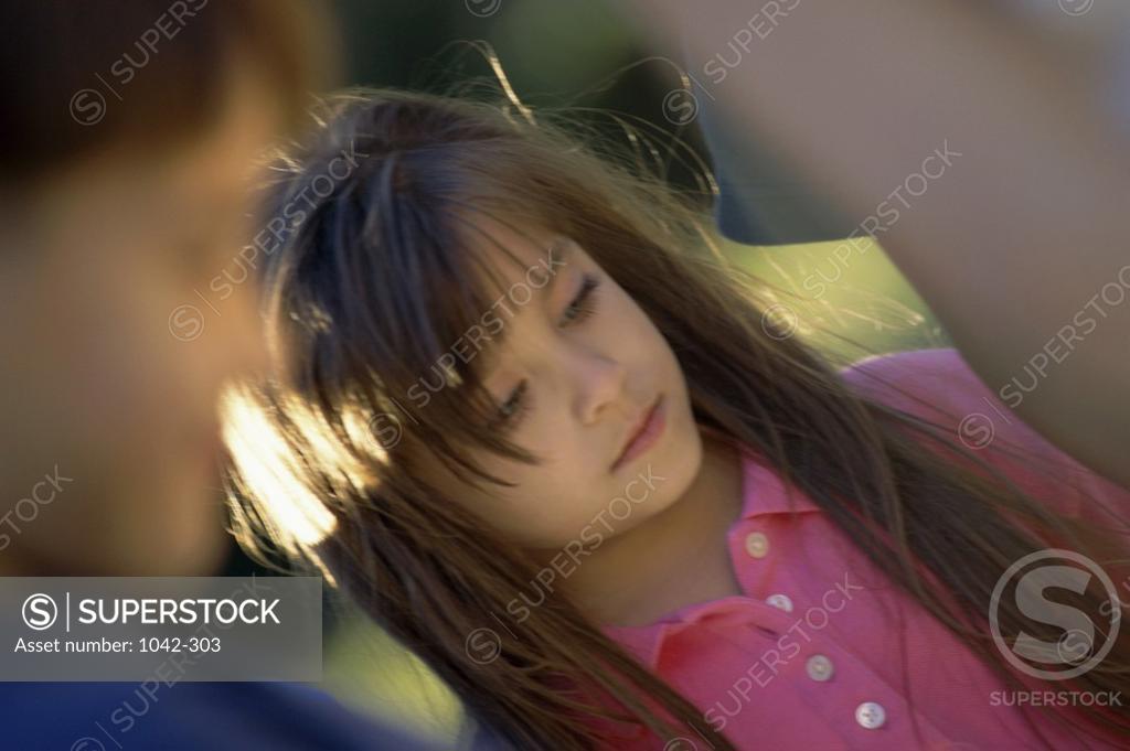 Stock Photo: 1042-303 Girl looking down