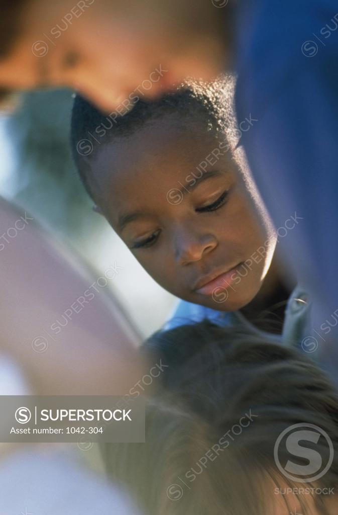 Stock Photo: 1042-304 Close-up of two boys looking serious