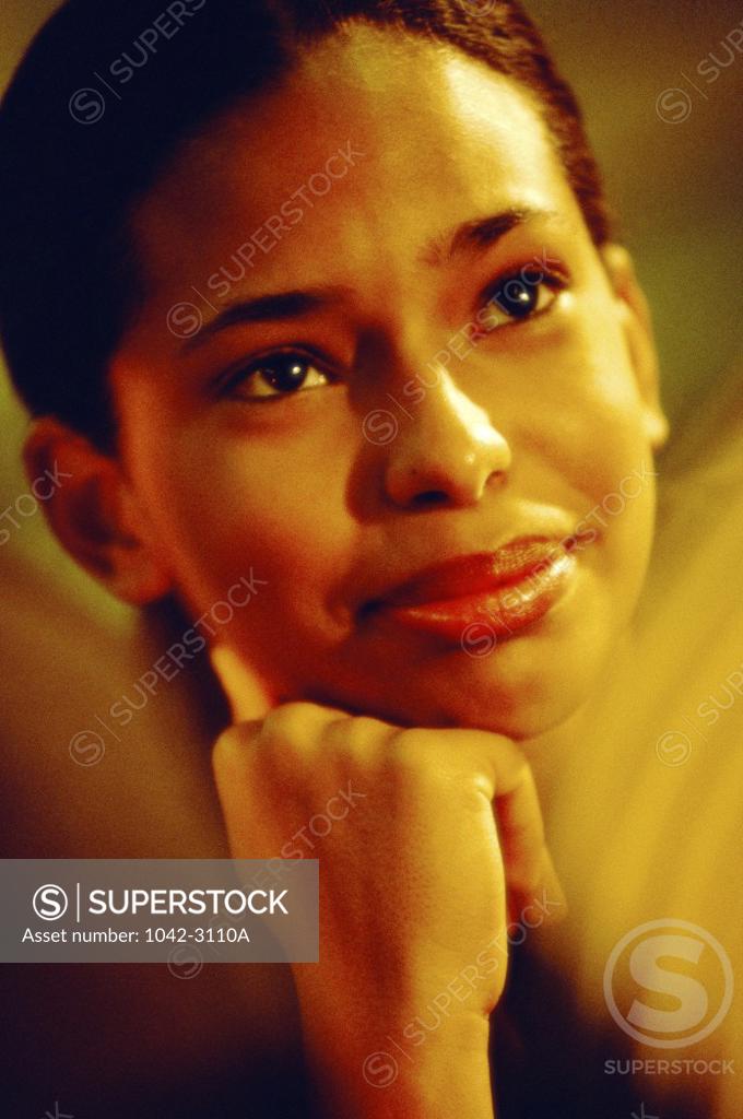 Stock Photo: 1042-3110A Close-up of a teenage girl thinking