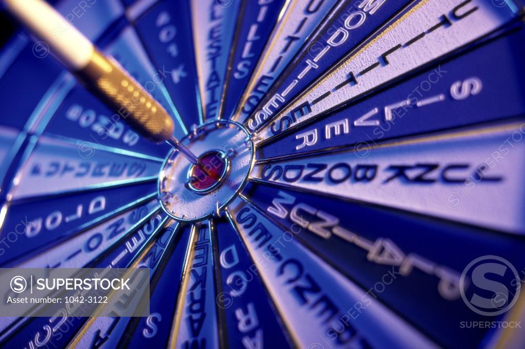 Stock Photo: 1042-3122 Close-up of a dart on a dartboard