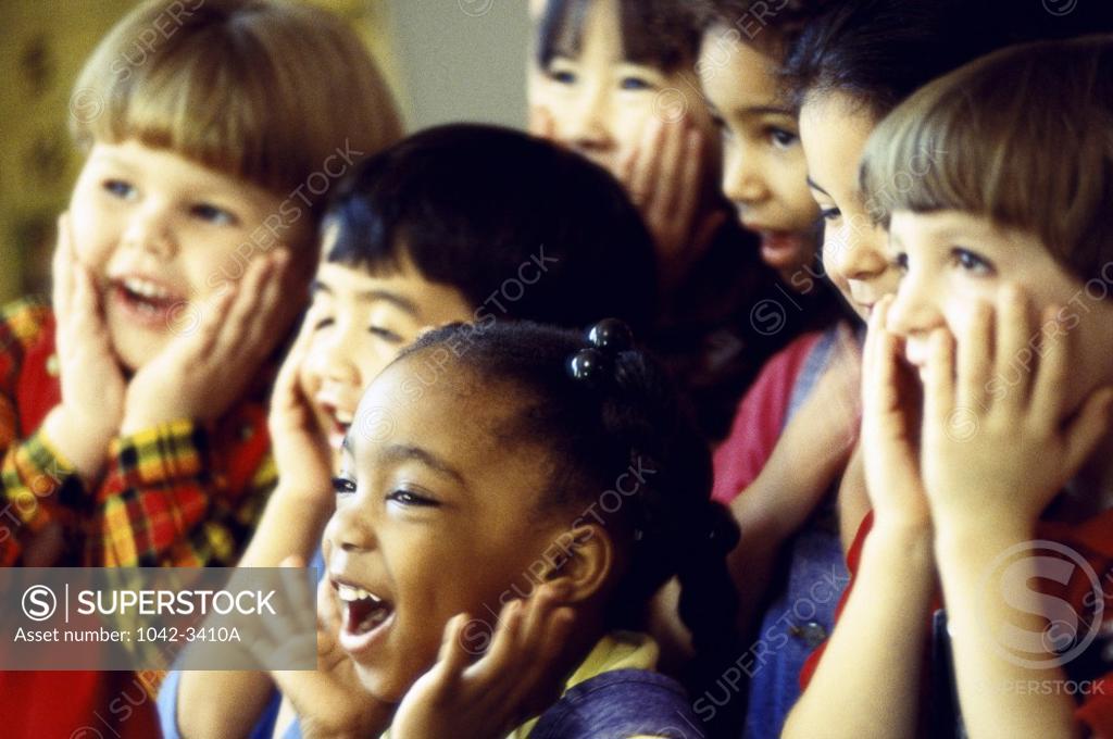 Stock Photo: 1042-3410A Group of children making faces