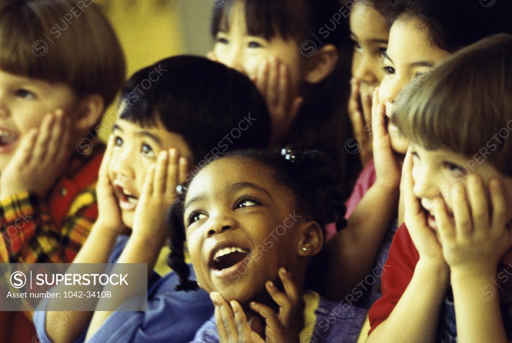 Stock Photo: 1042-3410B Group of children making faces
