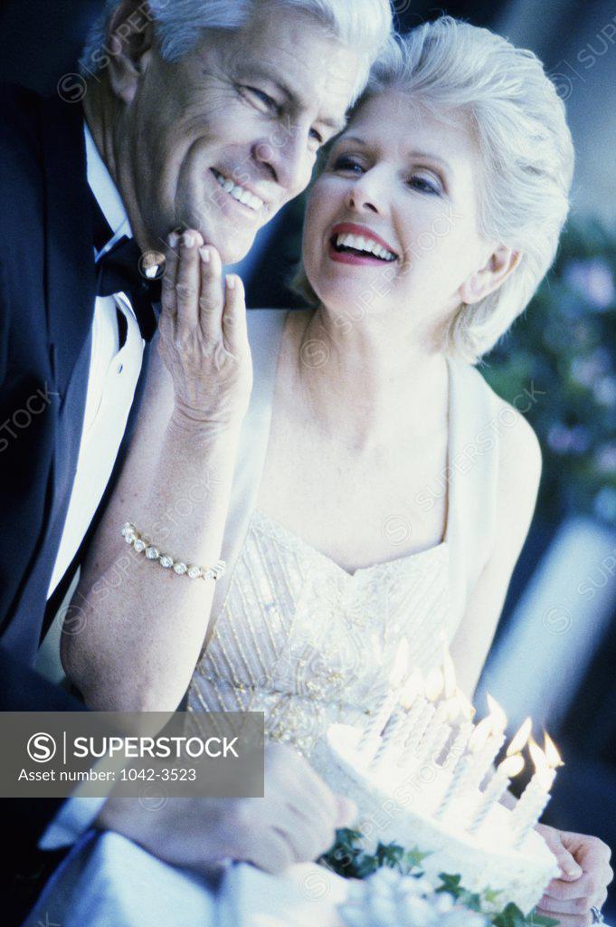 Stock Photo: 1042-3523 Close-up of a senior couple celebrating a birthday