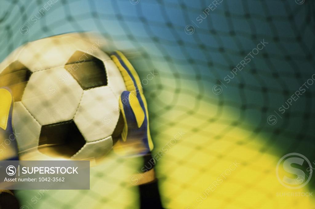 Stock Photo: 1042-3562 Goalie holding a soccer ball