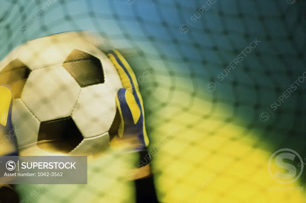 Goalie holding a soccer ball