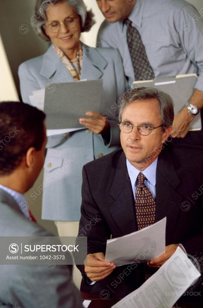 Stock Photo: 1042-3573 Group of business executives in an office