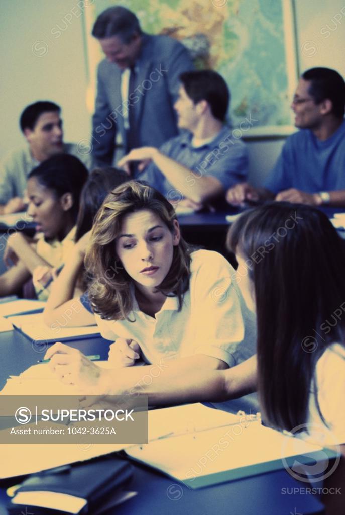 Stock Photo: 1042-3625A Group of teenagers in a classroom