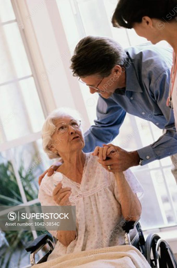 Stock Photo: 1042-3854C Mother talking to her son