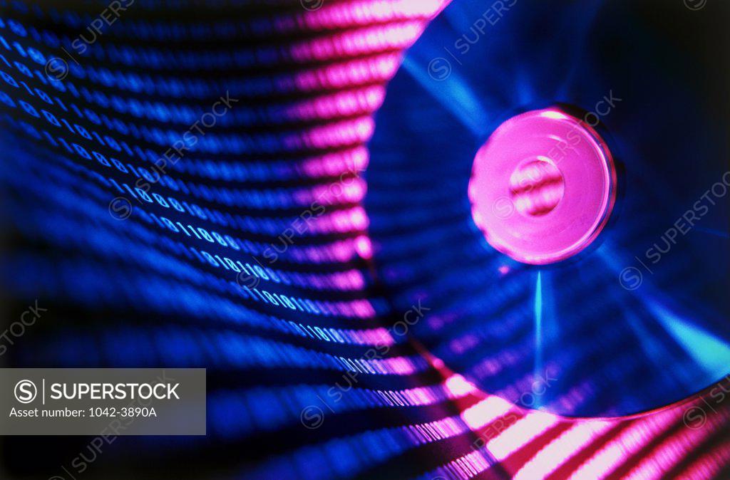 Stock Photo: 1042-3890A Compact disc with the reflection of binary code