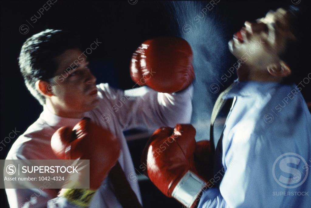 Stock Photo: 1042-4324 Two businessmen boxing