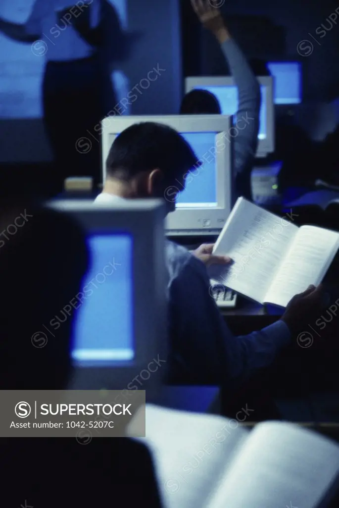 Group of people in a computer training class