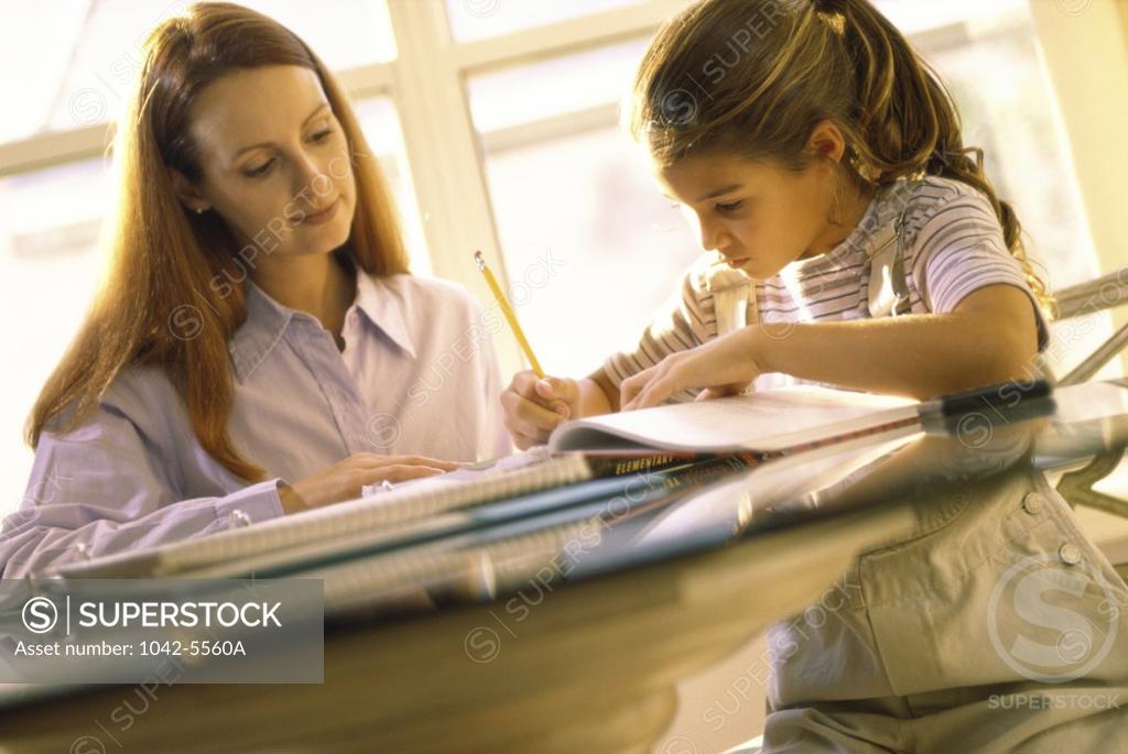 Stock Photo: 1042-5560A Mother teaching her daughter