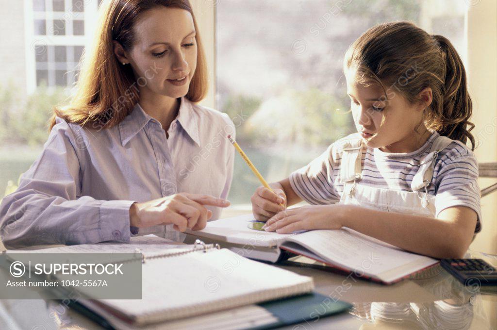 Stock Photo: 1042-5567A Mother teaching her daughter