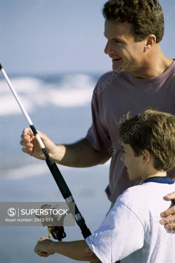 Stock Photo: 1042-595 Father and his son fishing