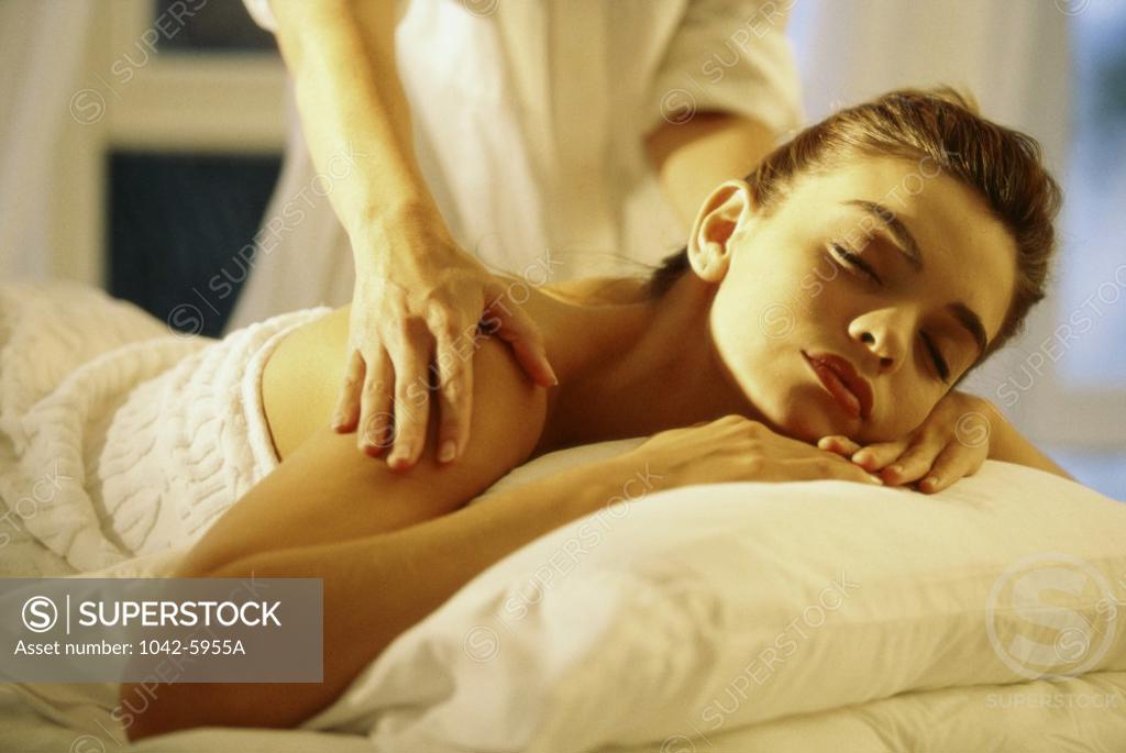 Stock Photo: 1042-5955A Close-up of a young woman getting a shoulder massage