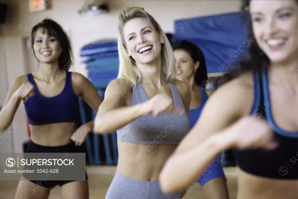 Young women exercising in an aerobics class