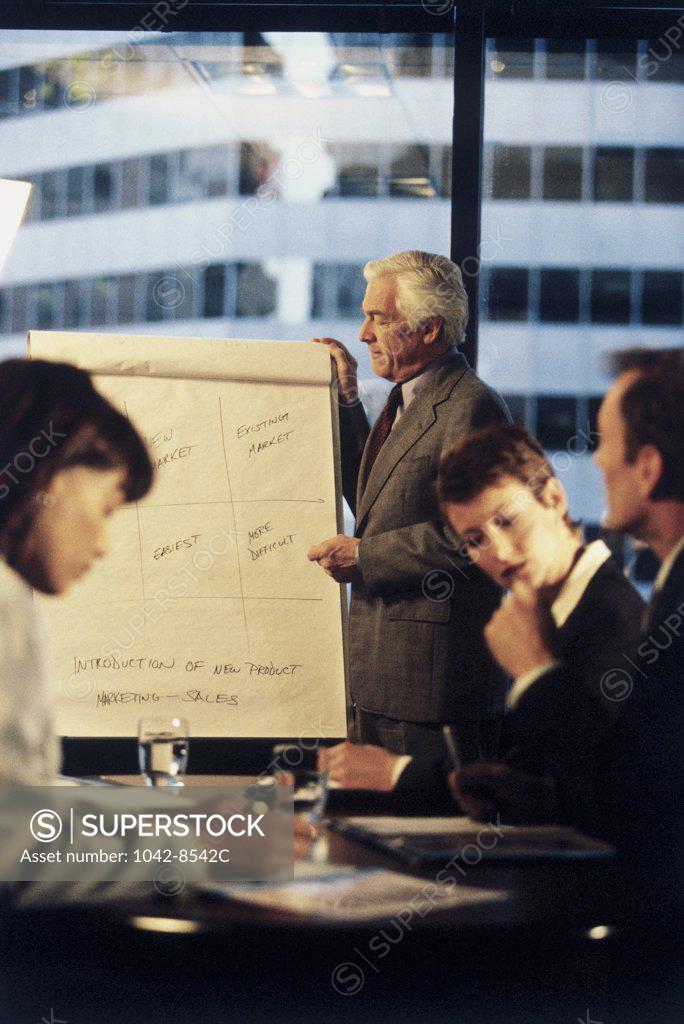Stock Photo: 1042-8542C Businessman giving a presentation in a meeting