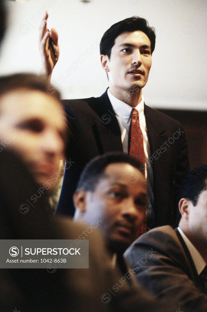 Stock Photo: 1042-863B Businessman gesturing in a meeting