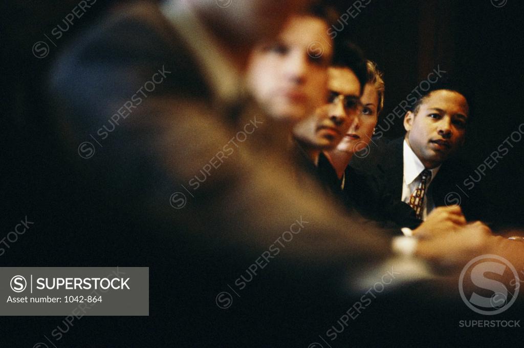 Stock Photo: 1042-864 Group of business executives sitting in an office