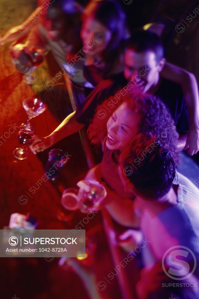 Stock Photo: 1042-8728A High angle view of a group of young people in a bar