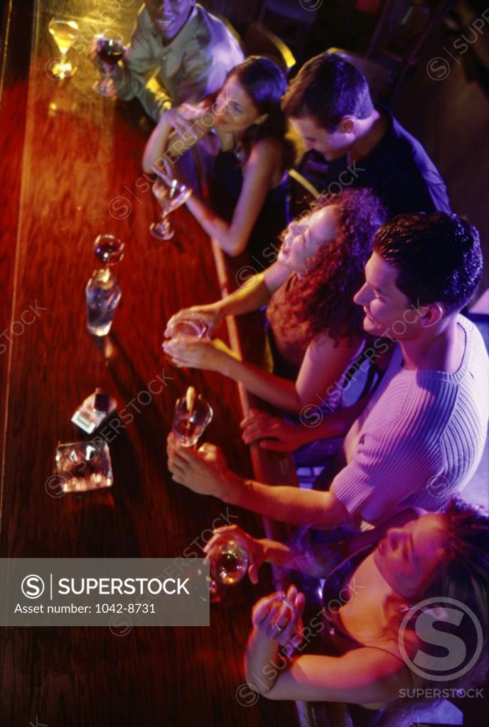 Stock Photo: 1042-8731 High angle view of a group of young people in a bar