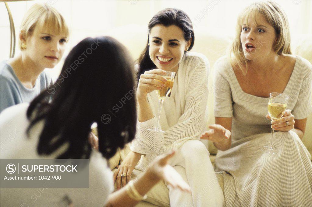 Stock Photo: 1042-900 Group of young women sitting together