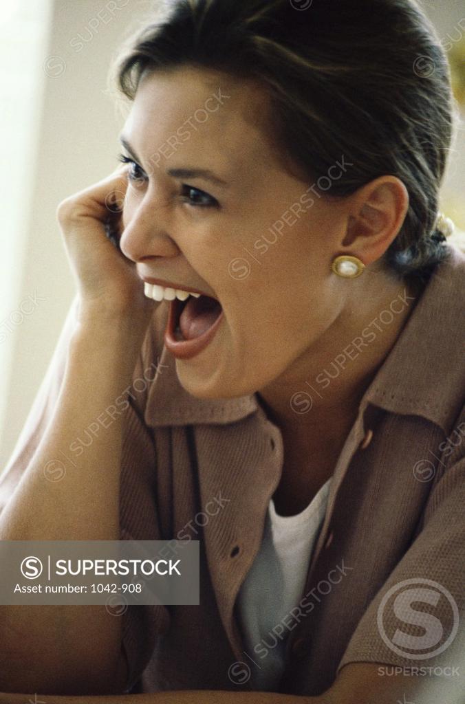 Stock Photo: 1042-908 Young woman laughing