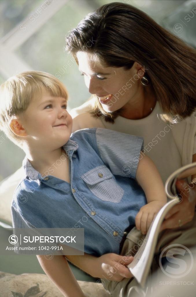 Stock Photo: 1042-991A Mother teaching her son