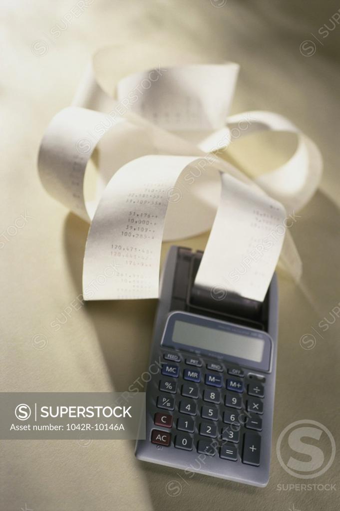 Stock Photo: 1042R-10146A Calculator and paper printout